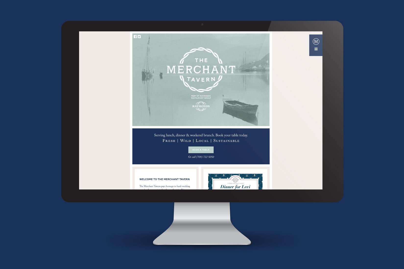 An iMac displaying the homepage of the The Merchant Taven website