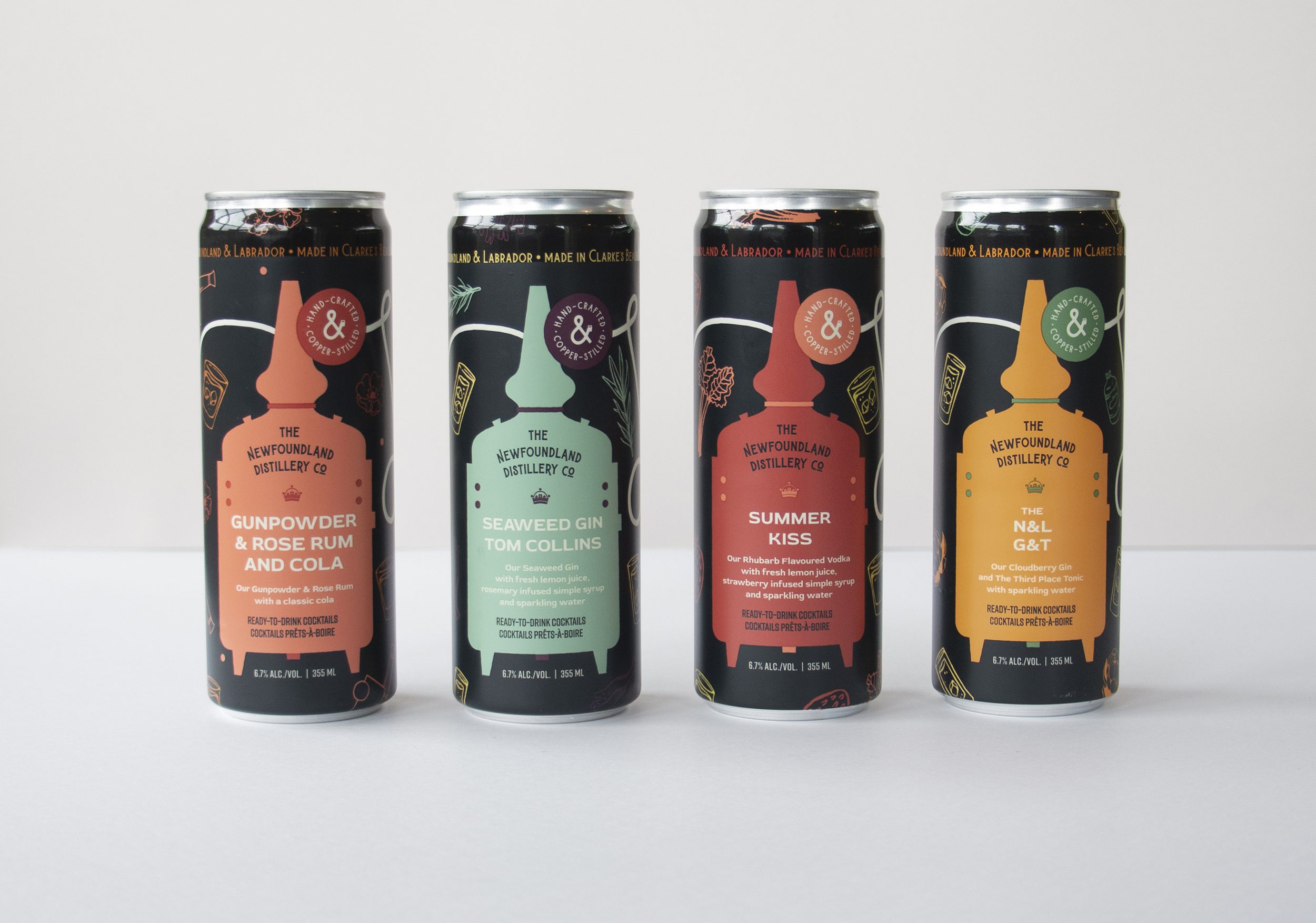 Four different ready-to-drink Newfoundland Distillery Company cocktail cans lined up against a white background